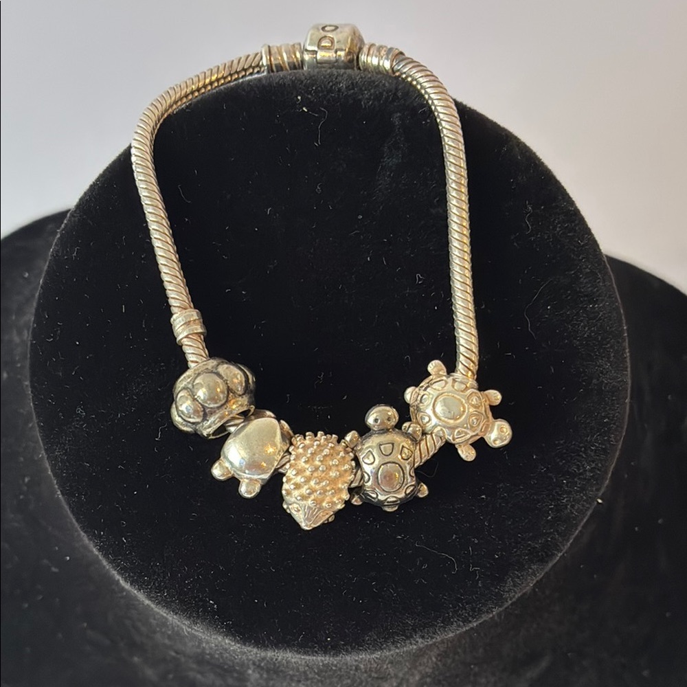 Vintage sterling silver Pandora snake bracelet with charms. Preowned